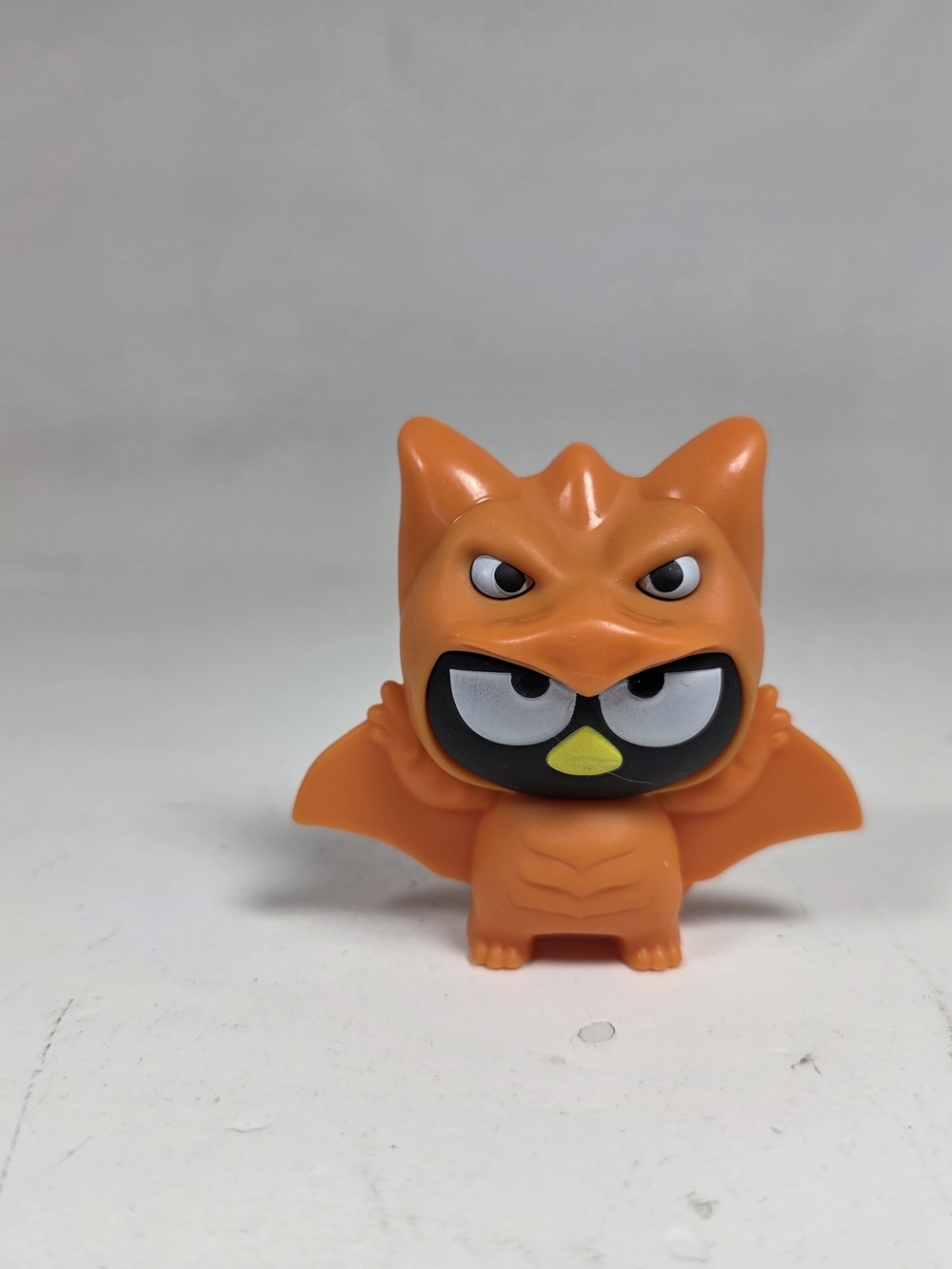 McDonald's Orange Bat-Owl Figure - Playful Collectible